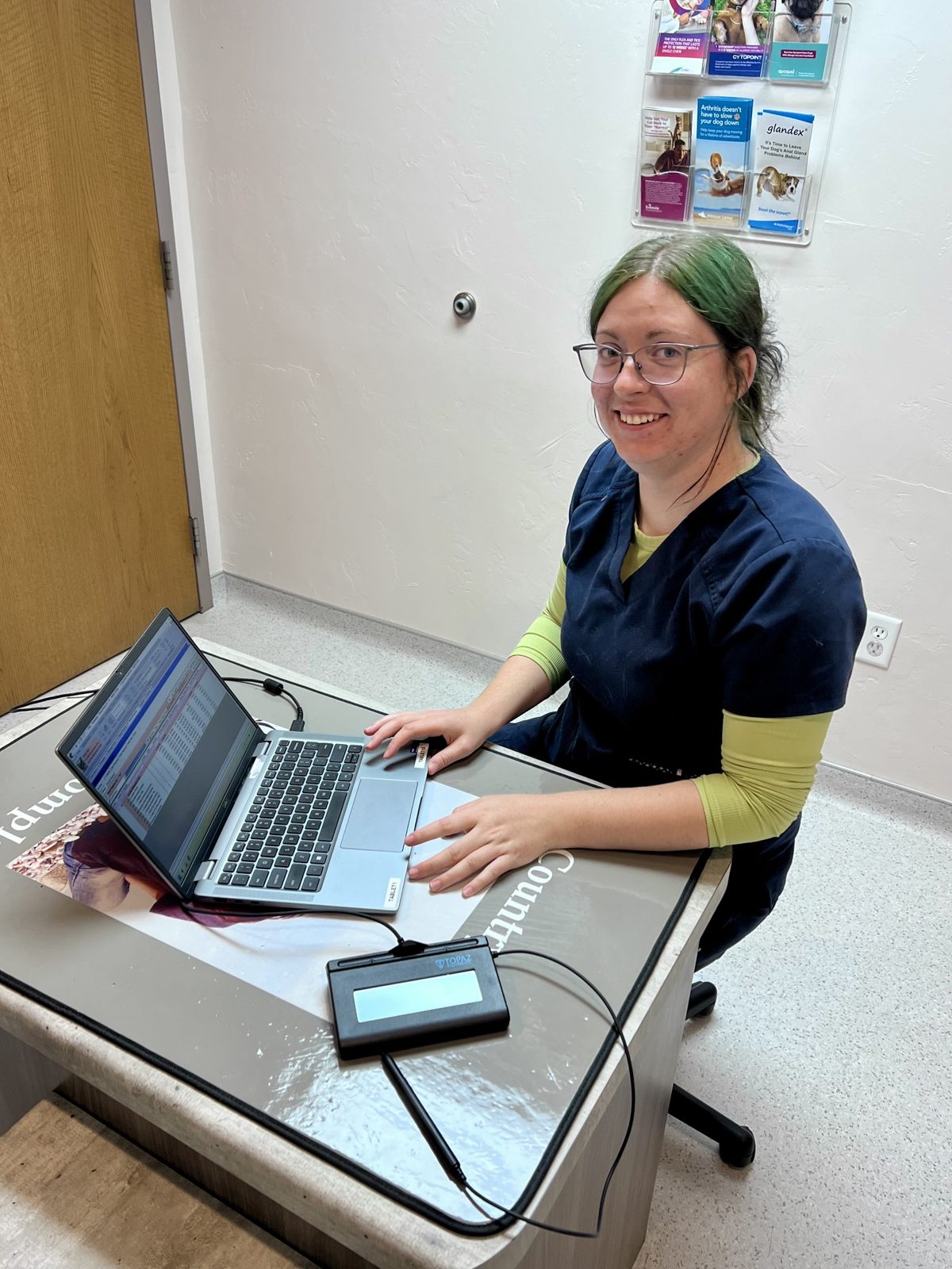 Shannon, a Countrycare surgical technician, checking a patient in for surgery